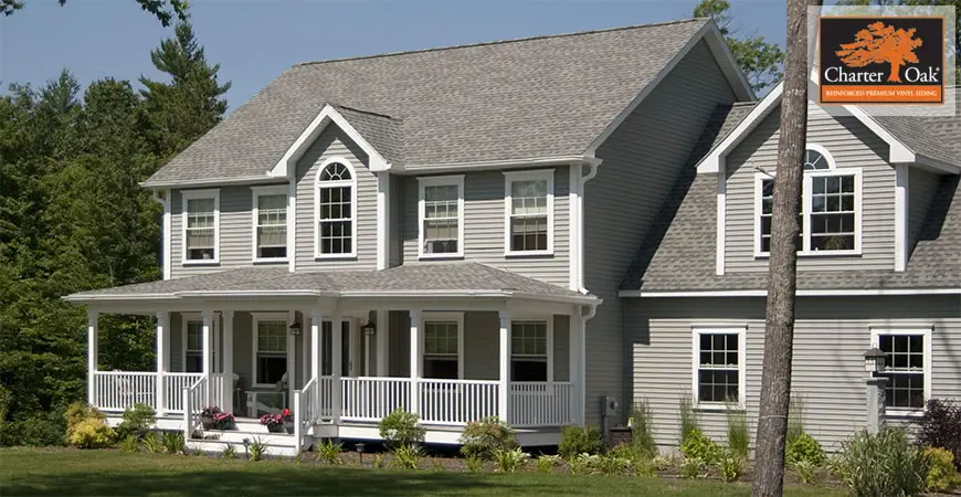 tan home with siding by the Window Source of West Texas